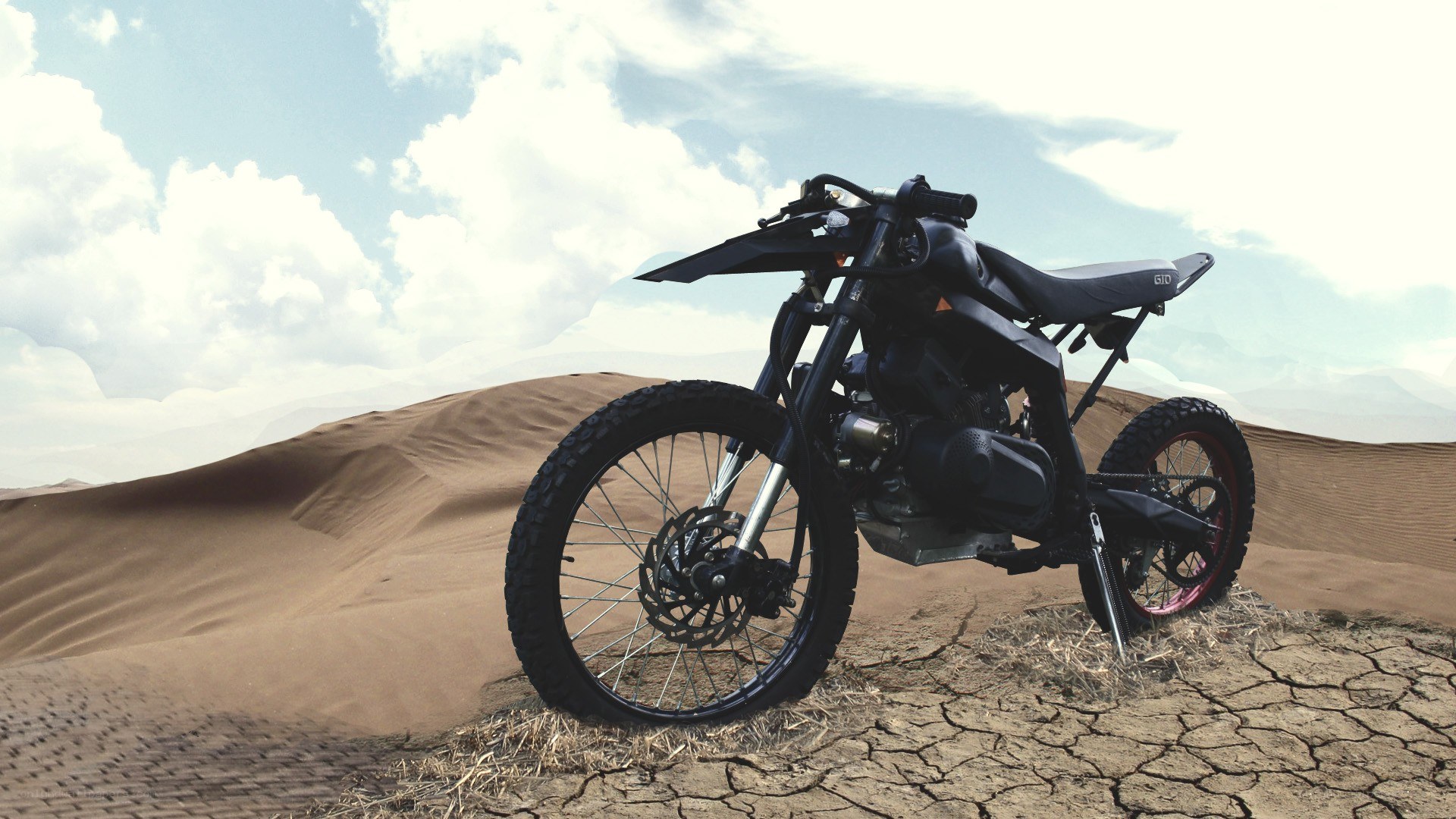 Black motorcycle in desert
