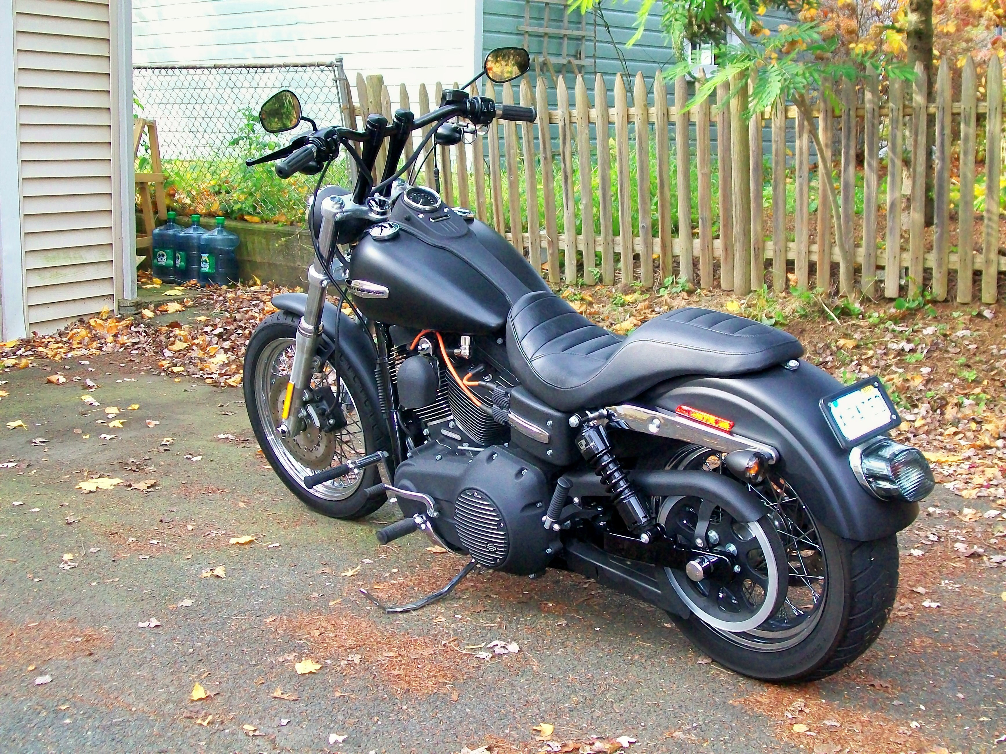 Black motorcycle in driveway
