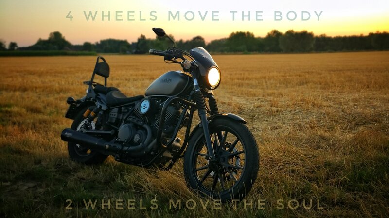 Black Motorcycle in Field — Brown