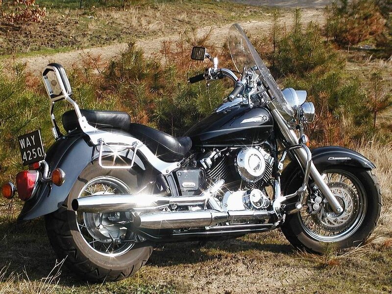 Black motorcycle in field