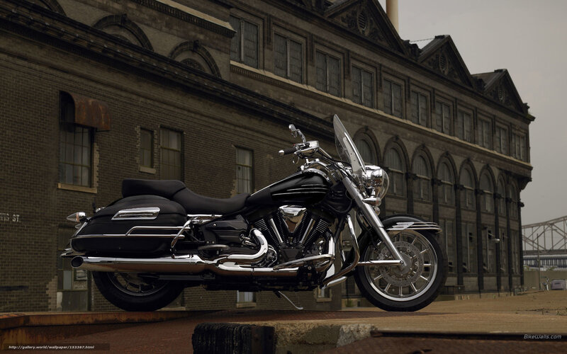 black motorcycle in front of building