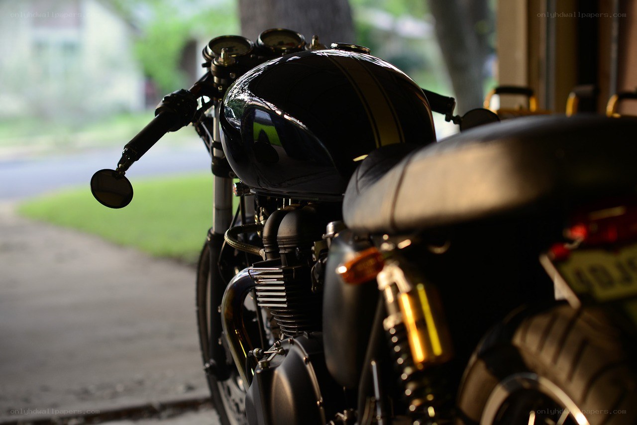 black motorcycle in garage