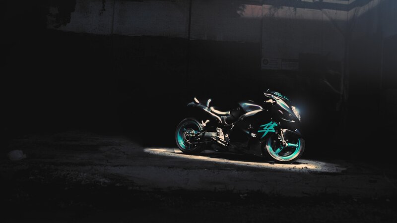Black Motorcycle in Garage — Dramatic, Night