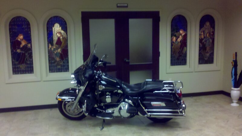 Black Motorcycle in Hallway