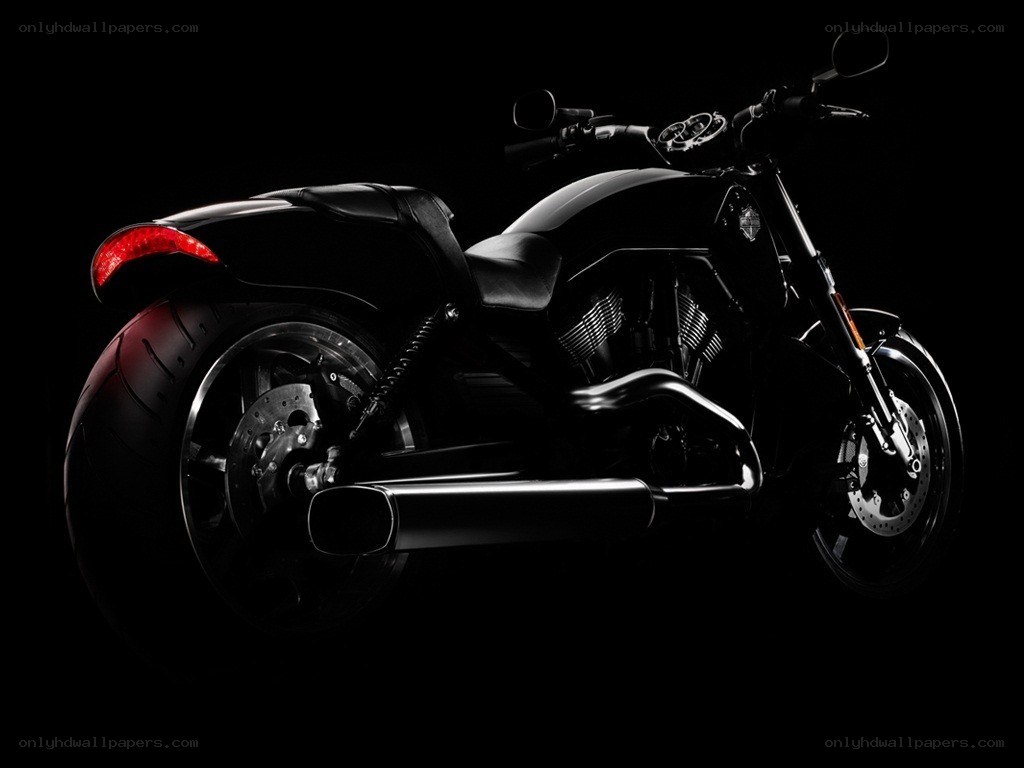 black motorcycle in silhouette