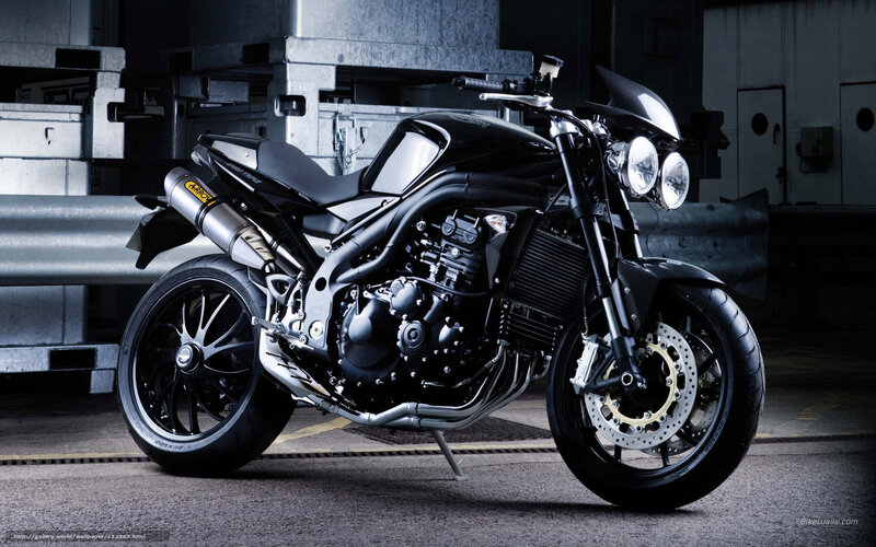 Black motorcycle in warehouse