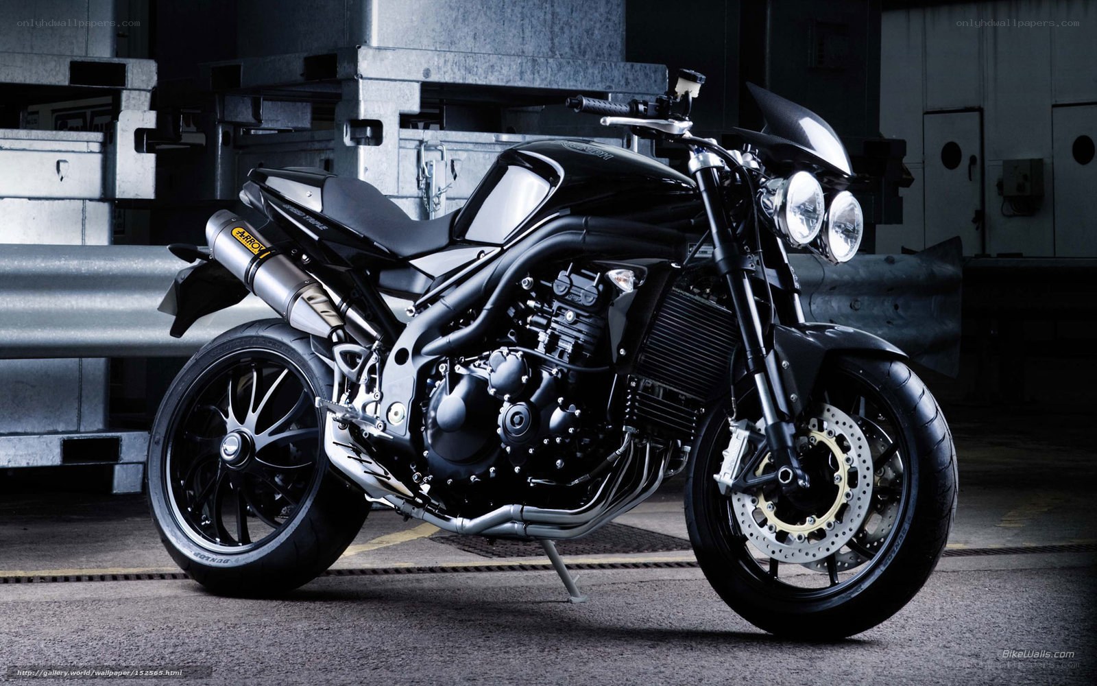 Black motorcycle in warehouse