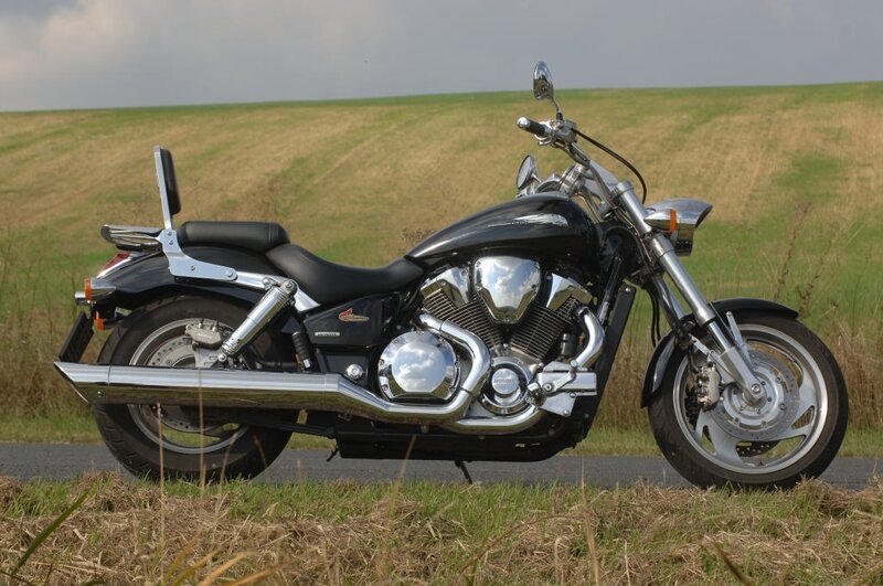 Black motorcycle on a country road