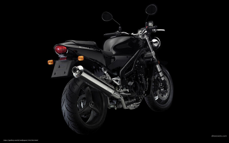 black motorcycle on black background
