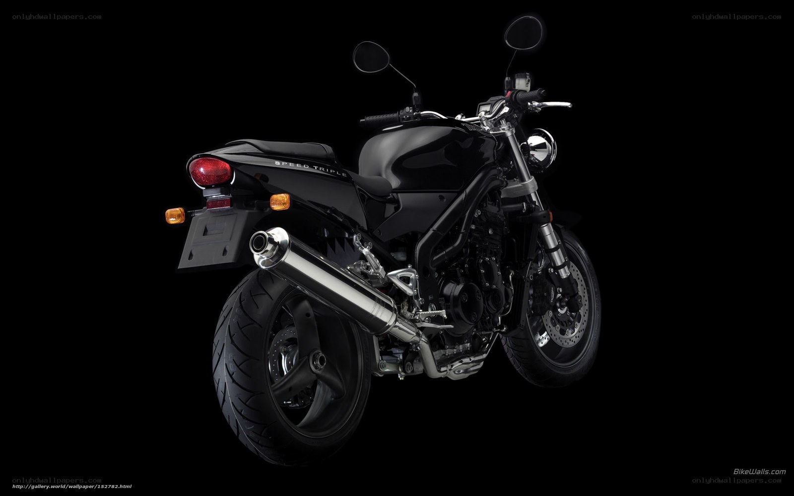 black motorcycle on black background