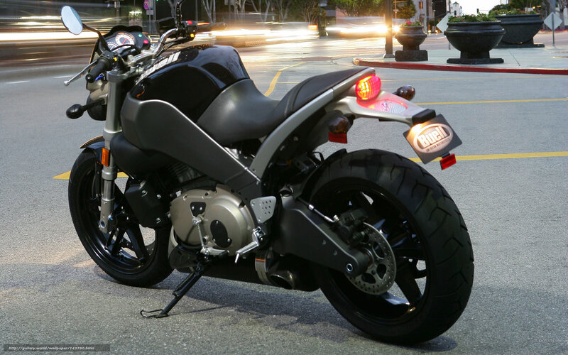 Black motorcycle on city street