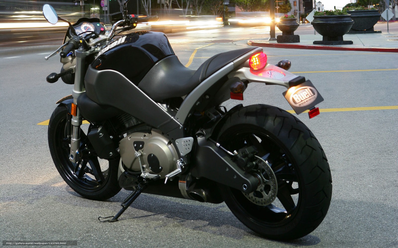 Black motorcycle on city street