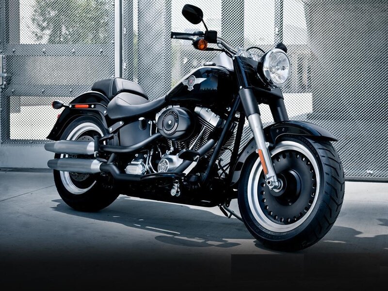 black motorcycle on concrete