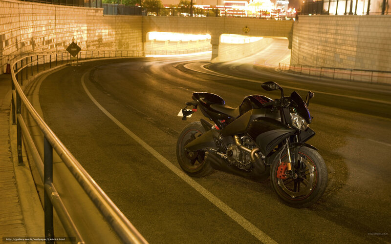 Black motorcycle on curved road