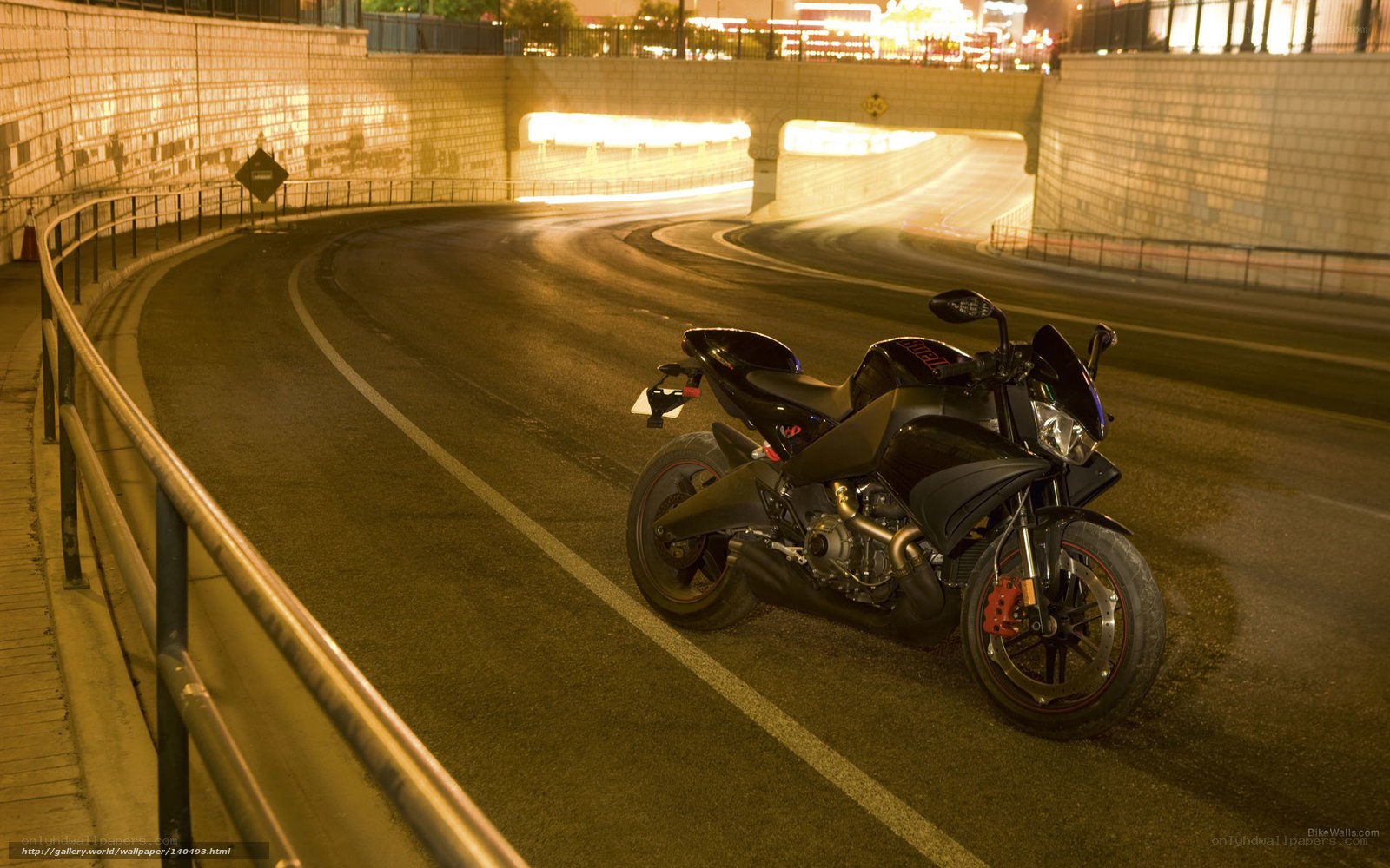 Black motorcycle on curved road