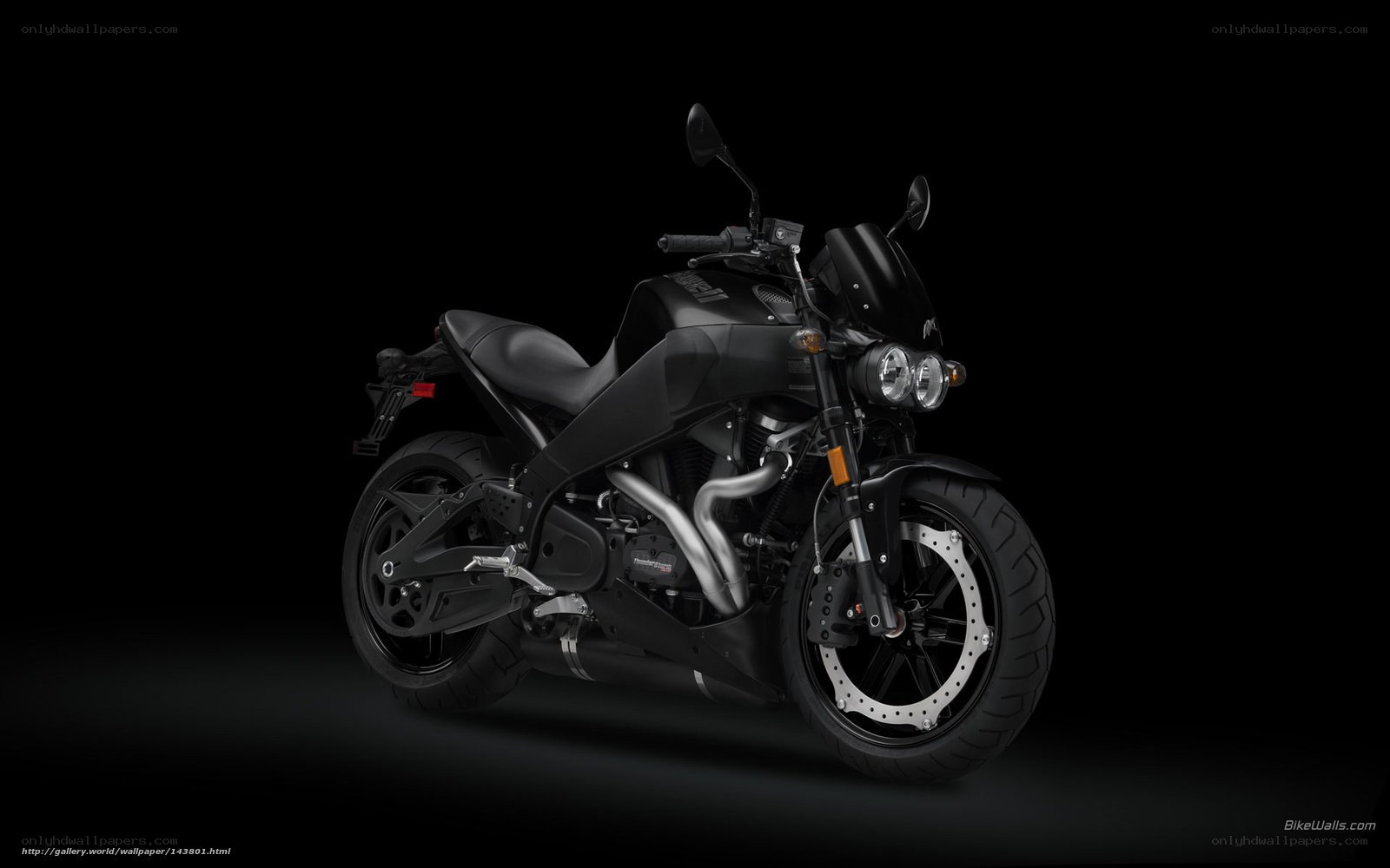 black motorcycle on dark background