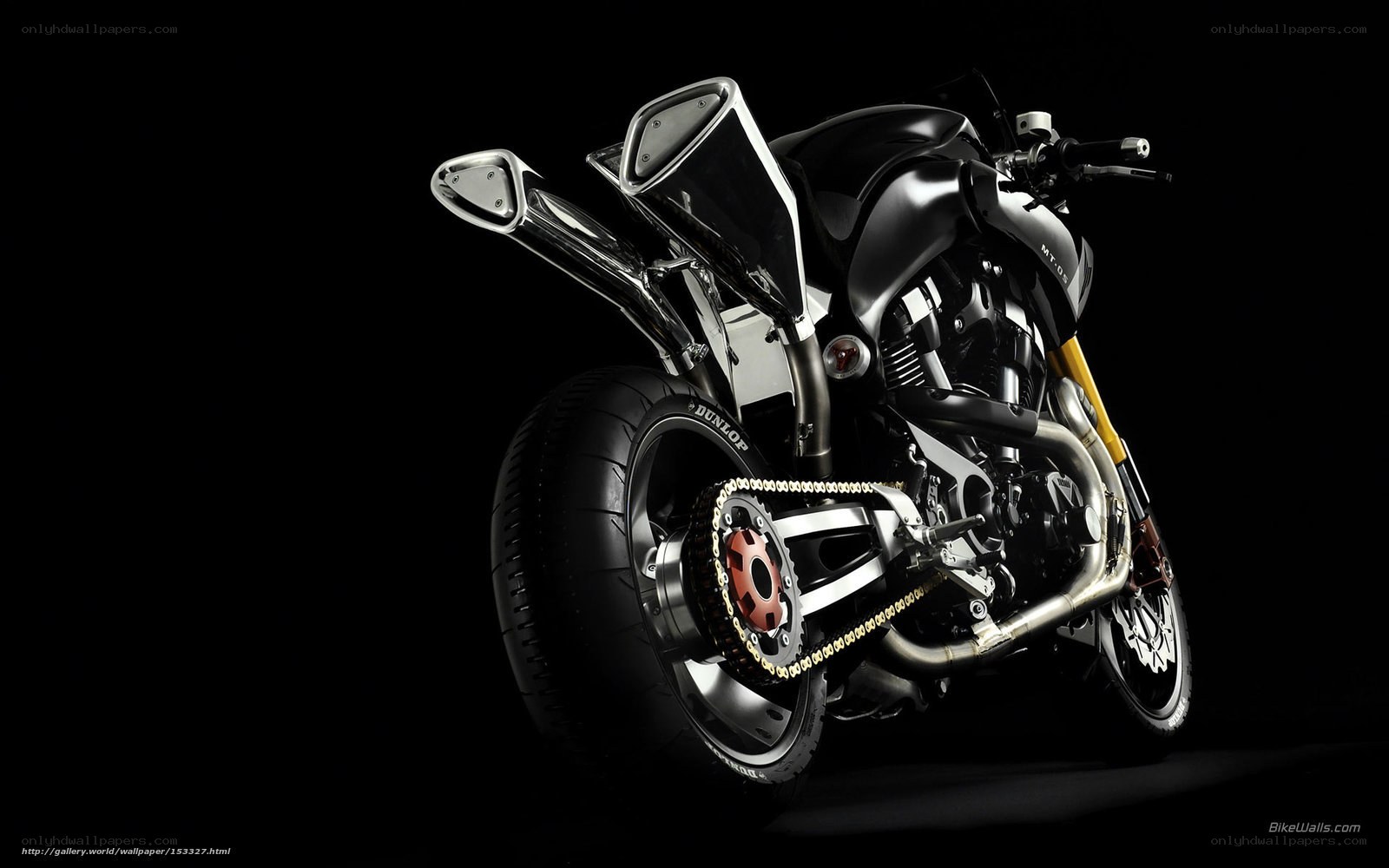 black motorcycle on dark background
