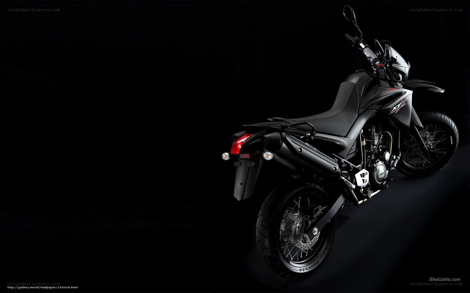 black motorcycle on dark background