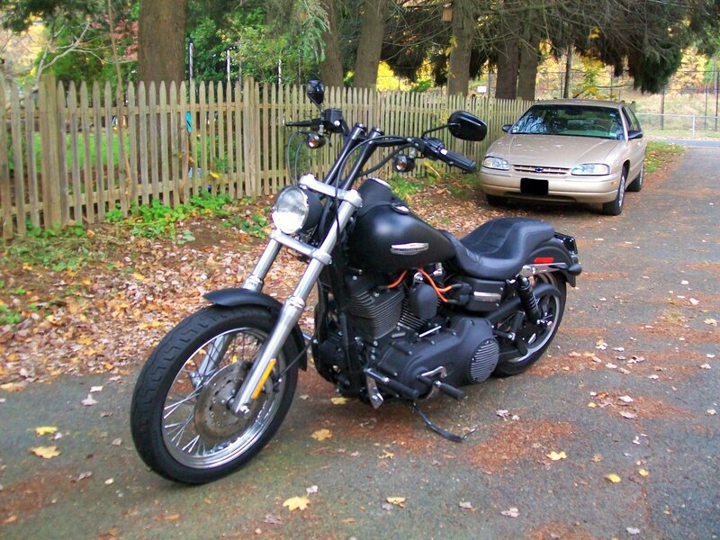Black motorcycle on driveway