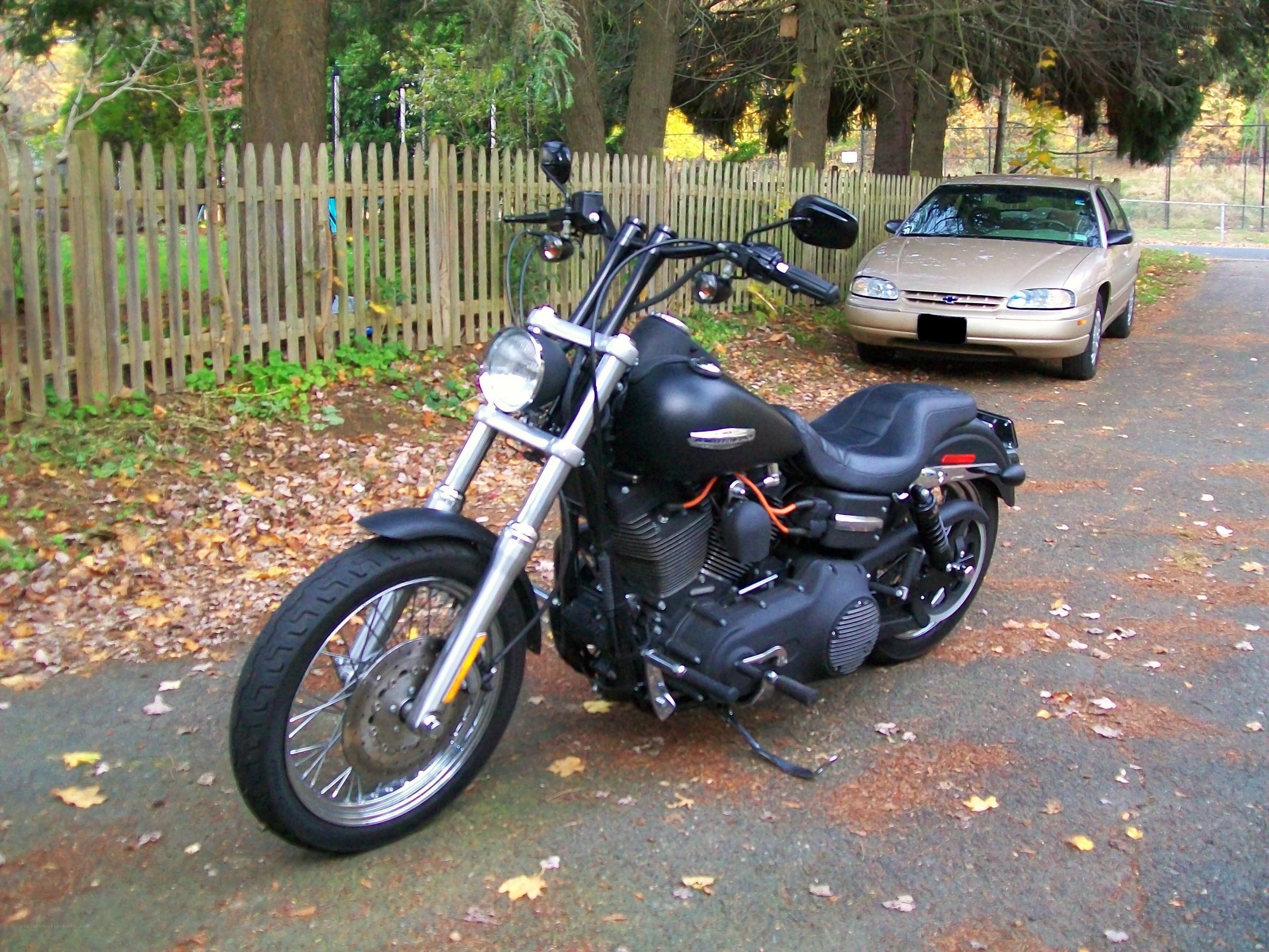 Black motorcycle on driveway