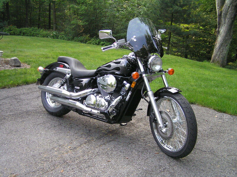 Black Motorcycle on Driveway — Serene