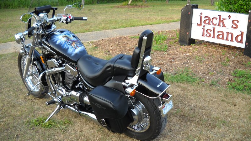 Black Motorcycle on Grass — Calm