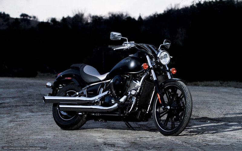 black motorcycle on gravel