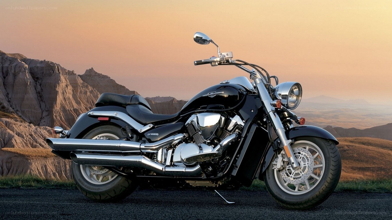 Black motorcycle on mountain road