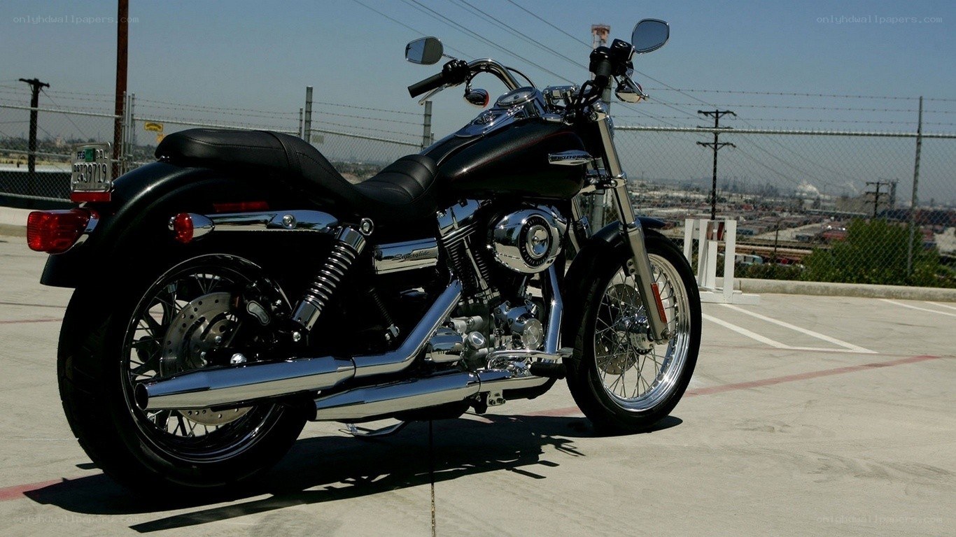 black motorcycle on parking lot