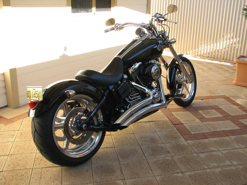 Black Motorcycle on Patio — Calm, Afternoon