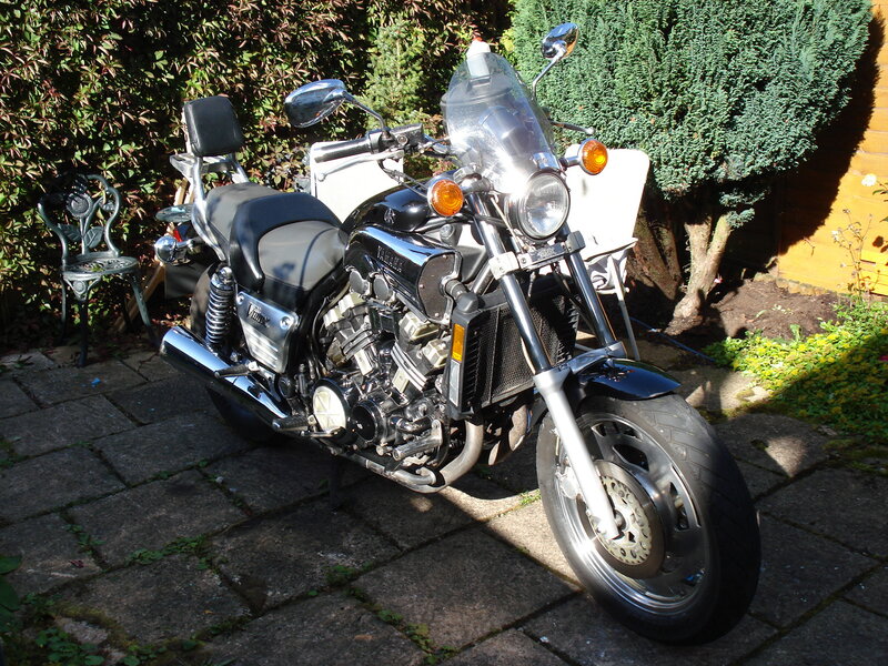 Black Motorcycle on Patio — Calm