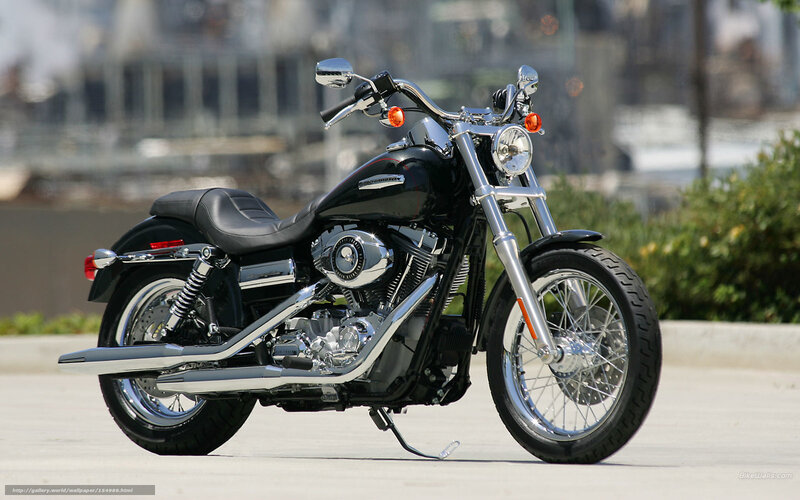 Black Motorcycle on Pavement — Calm, Afternoon, Photograph