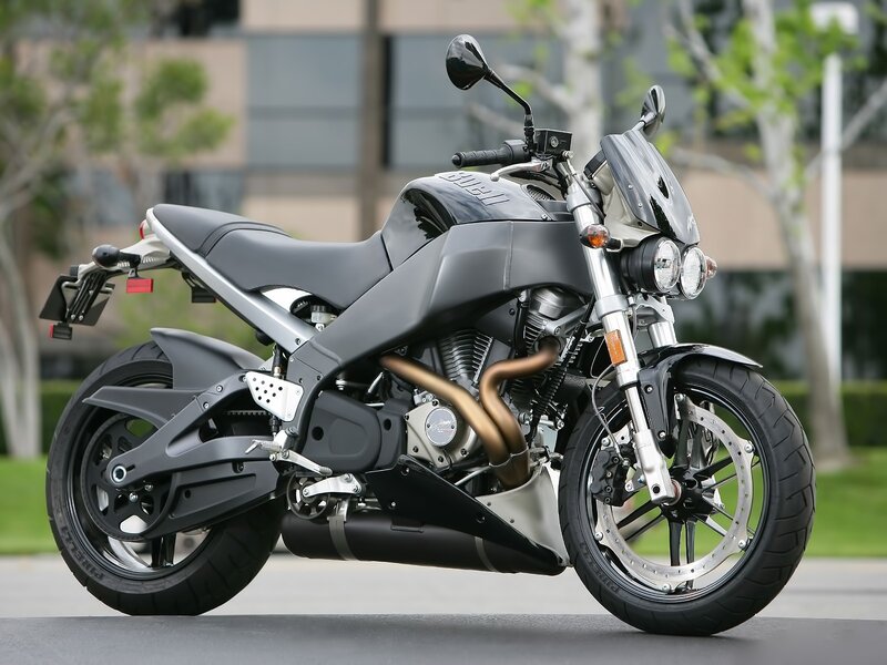 Black motorcycle on pavement