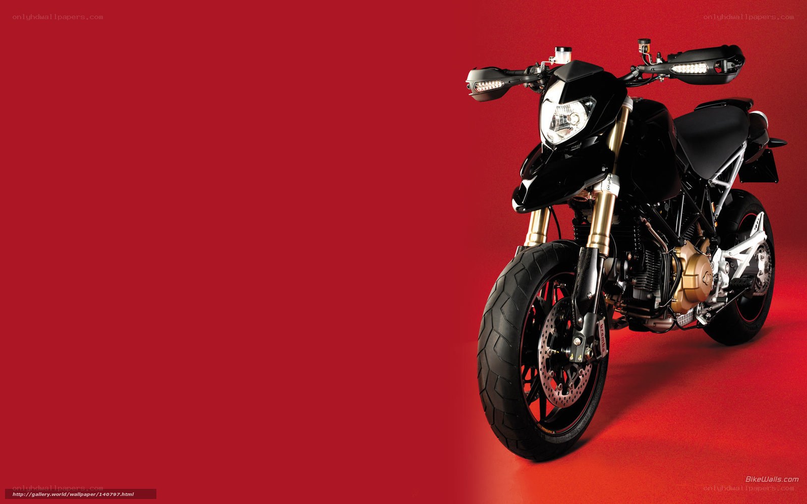 black motorcycle on red background