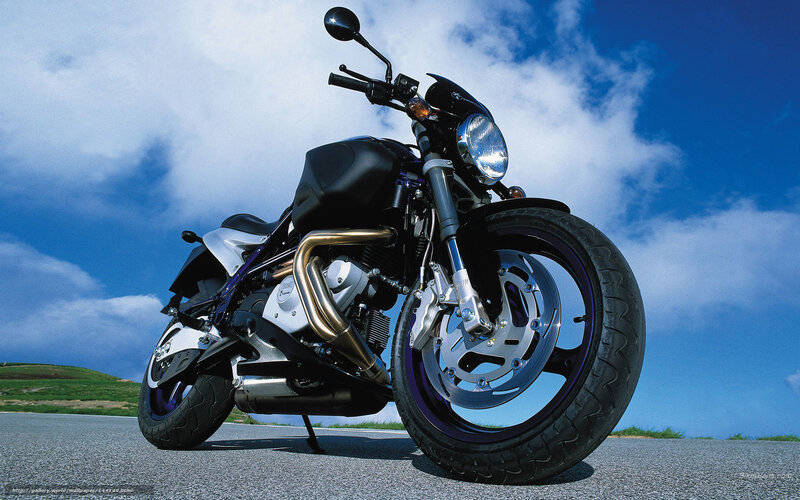 Black Motorcycle on Road — Blue, Dramatic