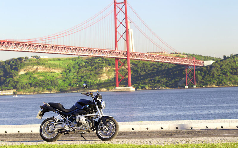 Black Motorcycle on Road — Blue