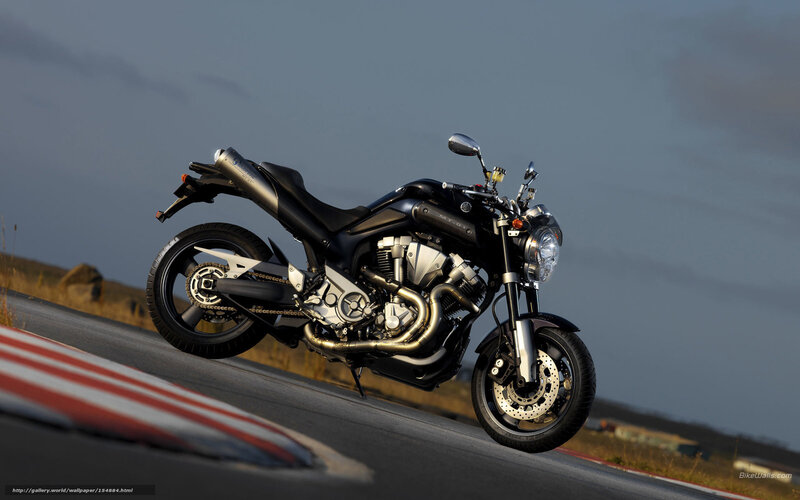 Black Motorcycle on Road — Dramatic, Sunset, Photograph