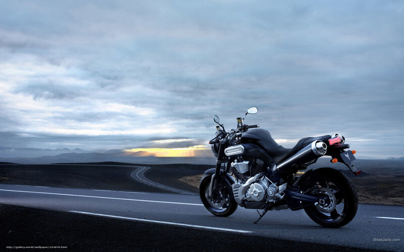 Black Motorcycle on Road — Gray, Dramatic