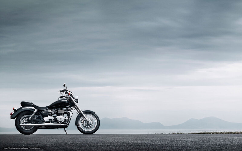 black motorcycle on road