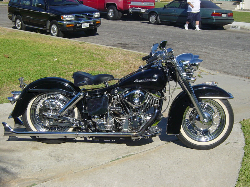 Black Motorcycle on Sidewalk — Calm