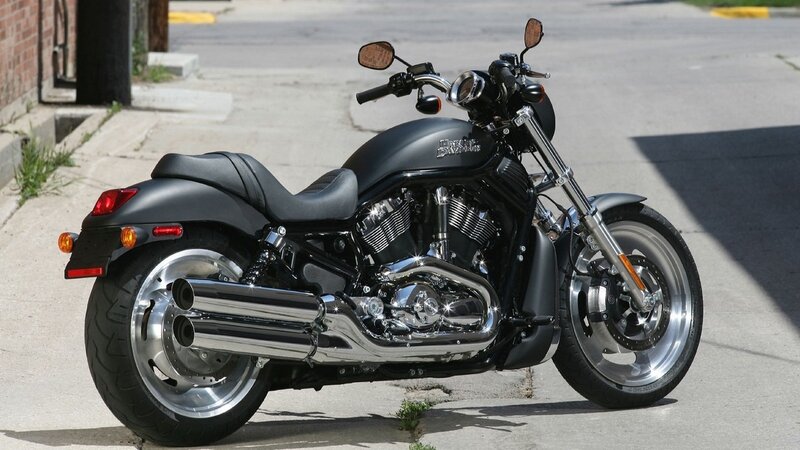 Black Motorcycle on Street — Calm, Afternoon, Photograph, Sidewalk, Brick Wall