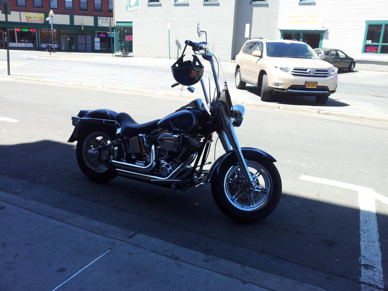 Black Motorcycle on Street — Daylight