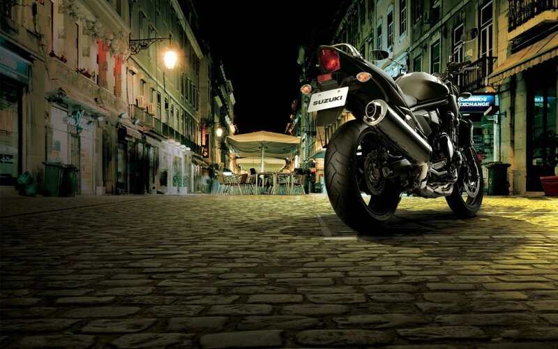 Black Motorcycle on Street — Dramatic