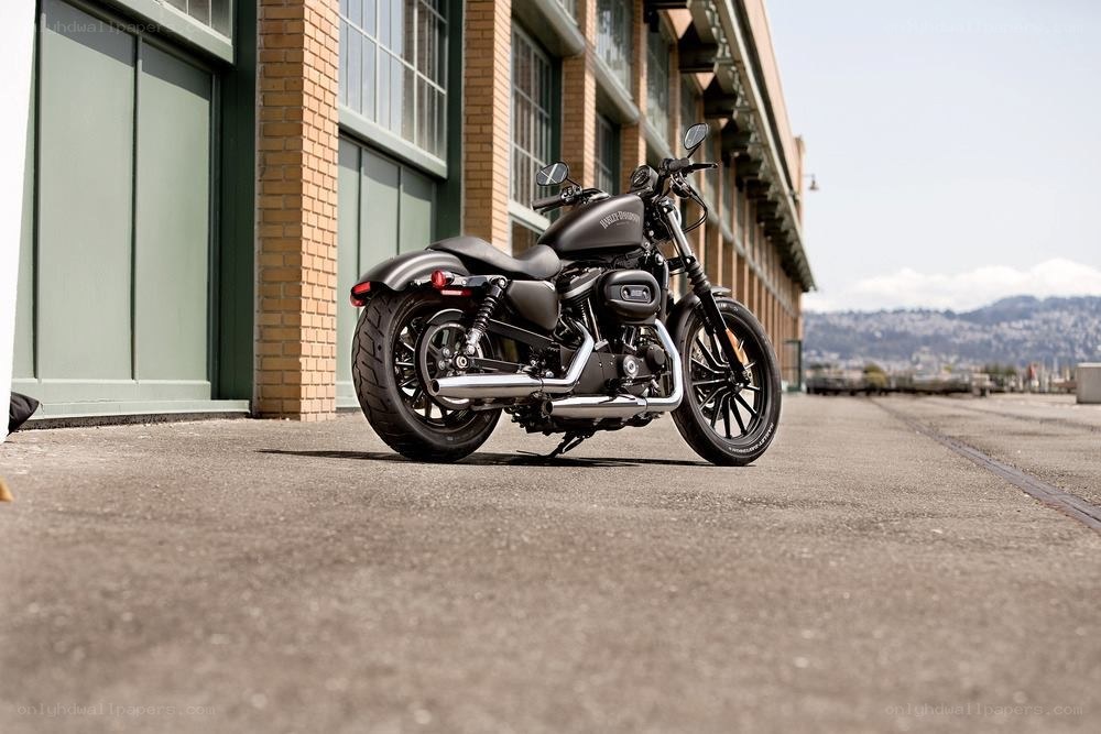 Black motorcycle parked outside