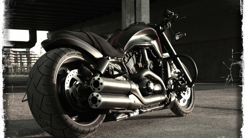 black motorcycle under bridge