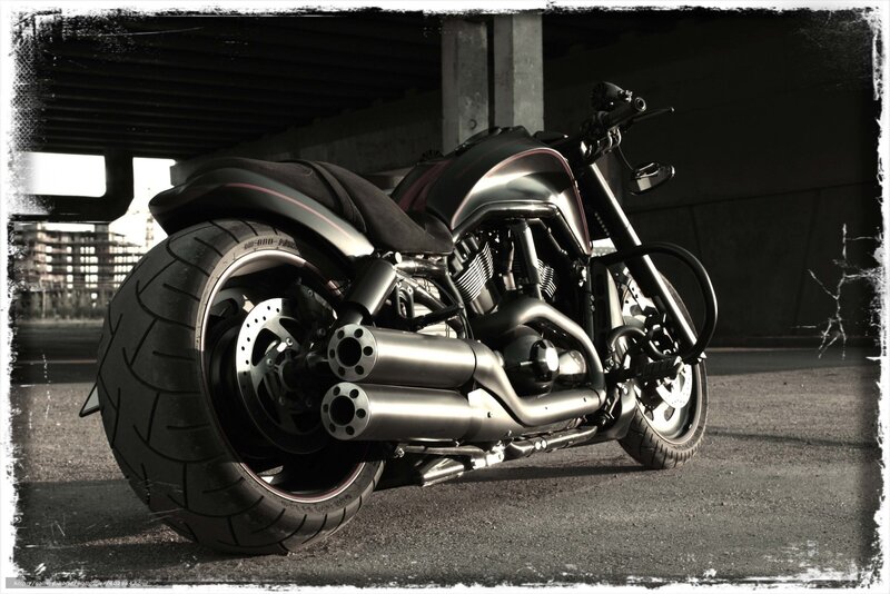 Black Motorcycle under Bridge — Dramatic