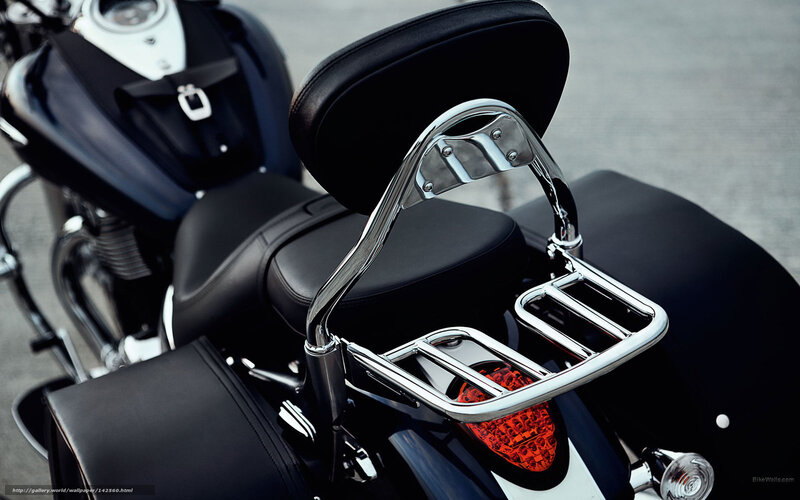 black motorcycle with chrome rack