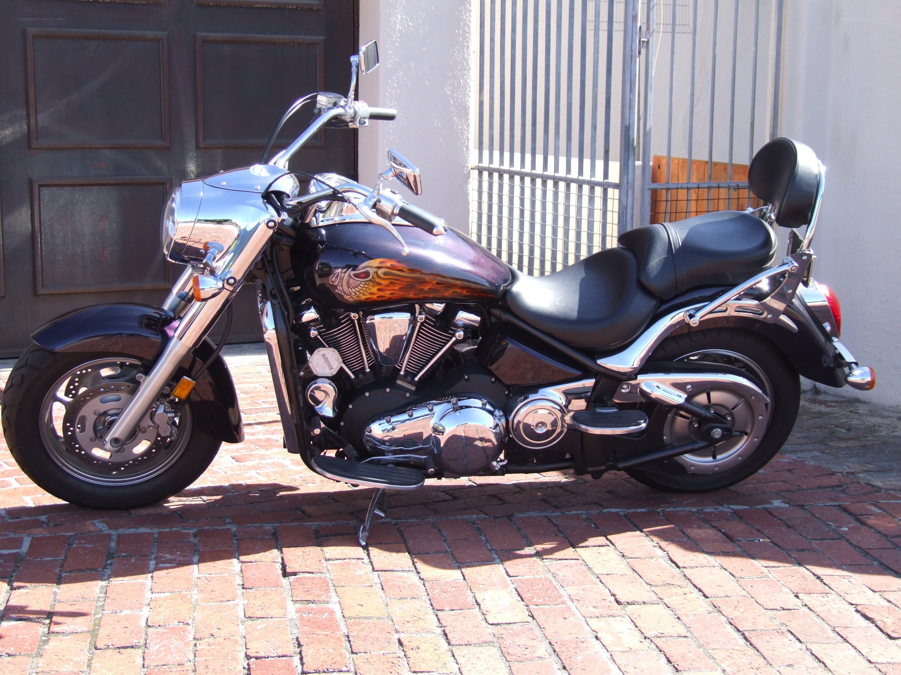 black motorcycle with flame design
