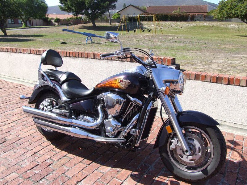 black motorcycle with flame design