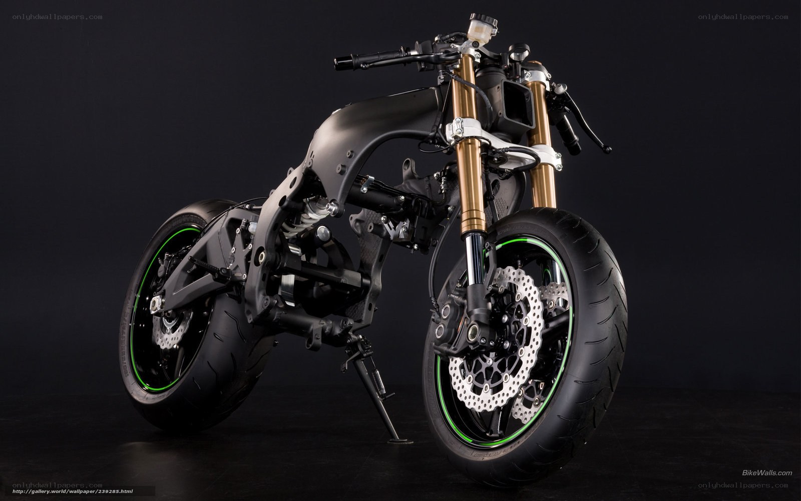 black motorcycle with green accents